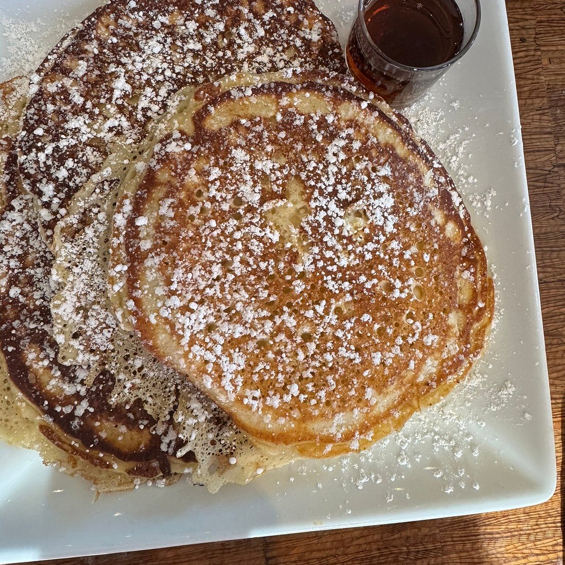 Grace’s Table signature dishes Pulled Pork and Egg Taco, Kobe Flat Iron Steak & Eggs, House Buttermilk Pancakes.